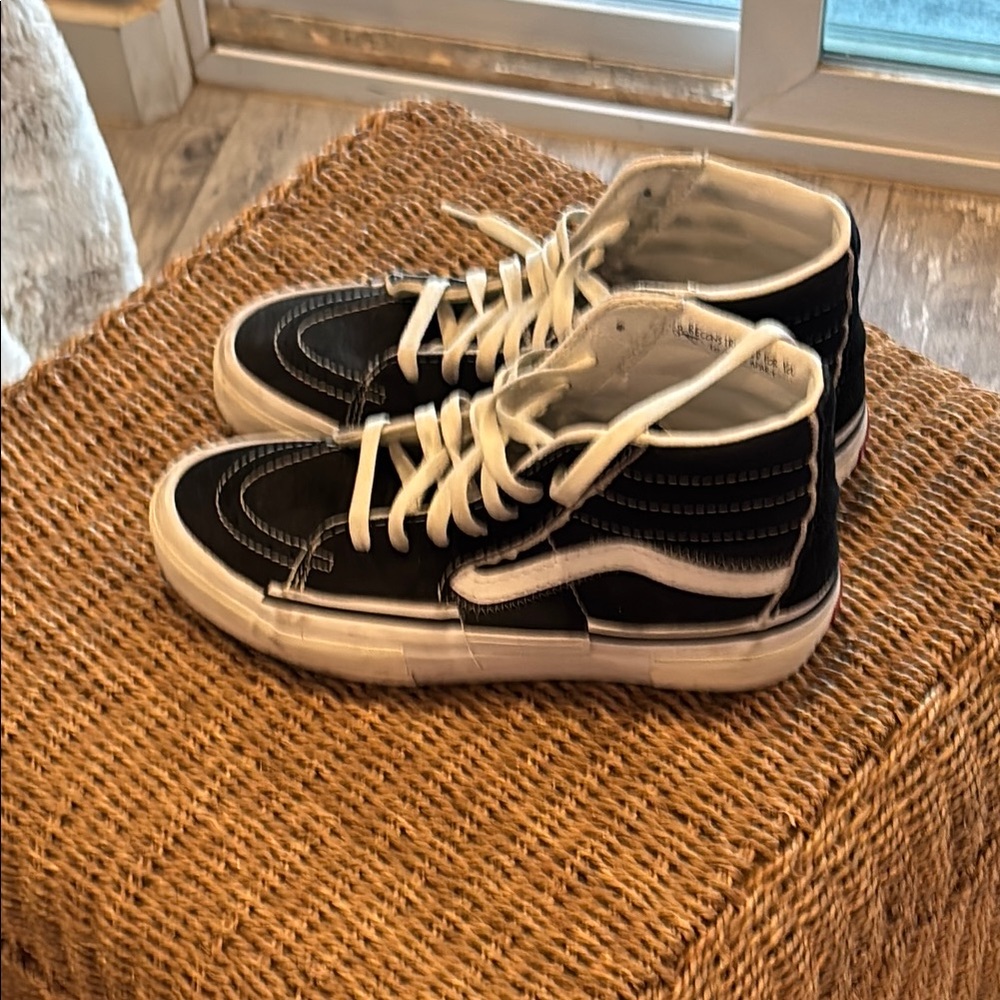 Vans Black and White High-Top Sneakers